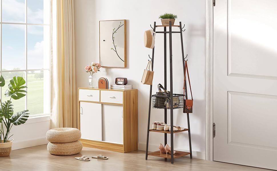 Light wood and white entryway storage cabinet paired with a tall black metal coat rack with hooks and wooden shelves, styled in a bright room with natural light.